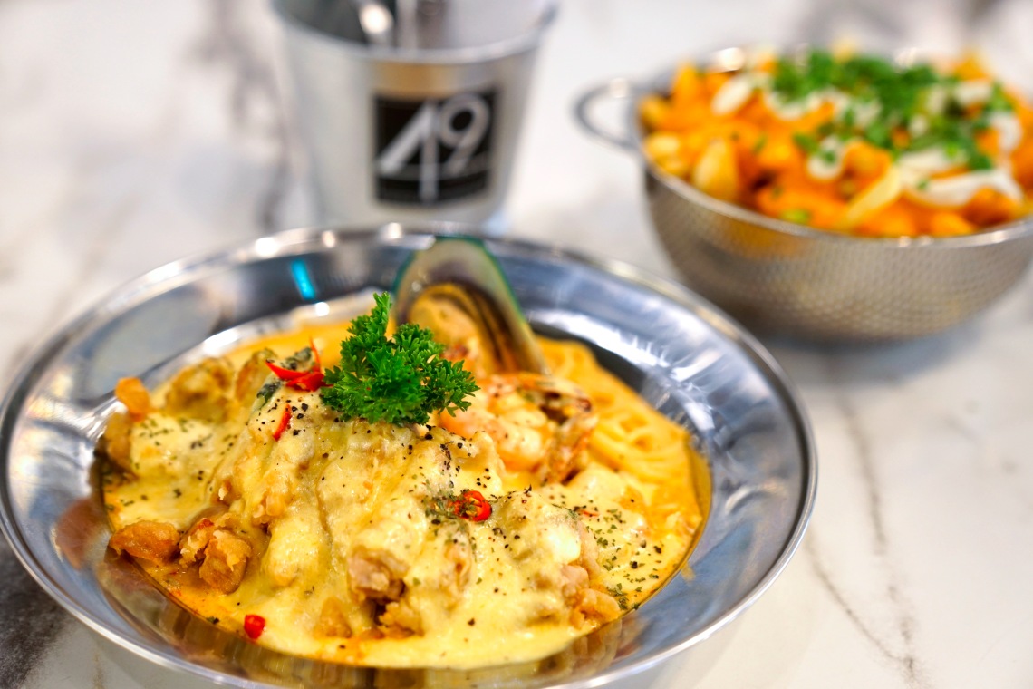 Tom Yum Salted Egg Pasta and Cheese Fries from 49 Seats